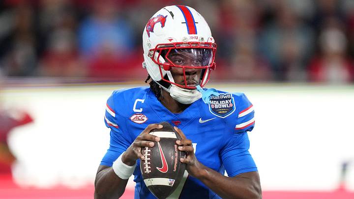 Jan 2, 2026; San Diego, CA, USA; SMU Mustangs quarterback Kevin Jennings (7) throws the ball against the Arizona Wildcats in the first half during the Holiday Bowl at Snapdragon Stadium. Mandatory Credit: Kirby Lee-Imagn Images