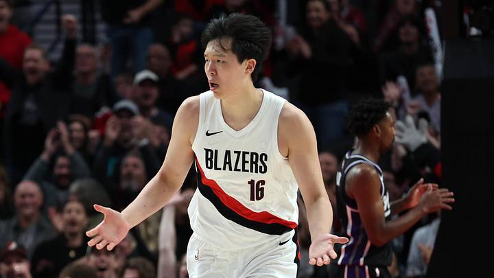 Oct 10, 2025; Portland, Oregon, USA;  Oct 10, 2025; Portland, Oregon, USA;  Portland Trail Blazers center Yang Hansen  (16) reacts after not getting a foul against Sacramento Kings in the second half at Moda Center. Mandatory Credit: Jaime Valdez-Imagn Images