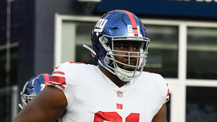 Aug 11, 2022; Foxborough, Massachusetts, USA; New York Giants offensive tackle Roy Mbaeteka (61) takes the field for a preseason game against New England Patriots during the first half at Gillette Stadium. Mandatory Credit: Eric Canha-Imagn Images Aug 11, 2022; Foxborough, Massachusetts, USA; New York Giants offensive tackle Roy Mbaeteka (61) takes the field for a preseason game against New England Patriots during the first half at Gillette Stadium. Mandatory Credit: Eric Canha-Imagn Images