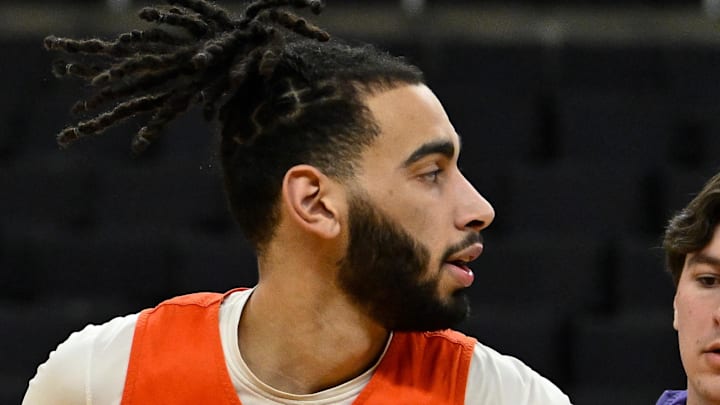 Mar 19, 2025; Providence, RI, USA; Clemson Tigers center Christian Reeves (14) works with a coaching assistant at a practice at Amica Mutual Pavilion. Mandatory Credit: Eric Canha-Imagn Images