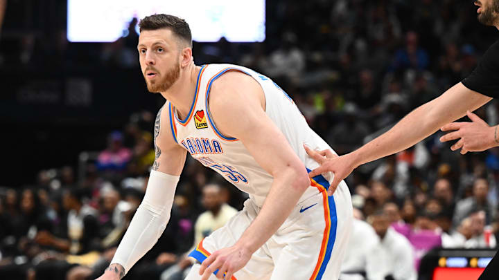 Mar 21, 2026; Washington, District of Columbia, USA; Oklahoma City Thunder center/forward Isaiah Hartenstein (55) dribbles as Washington Wizards forward Tristan Vukcevic (00) defends during the second half at Capital One Arena. Mandatory Credit: Brad Mills-Imagn Images