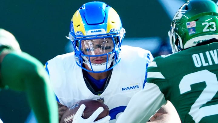 Los Angeles Rams running back Blake Corum (22) runs with the ball as he heads towards the Jets defense, Sunday, December 22, 2024.