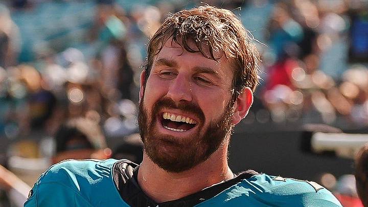 Jacksonville Jaguars offensive tackle Cole van Lanen (70) and Jacksonville Jaguars offensive tackle Walker Little (72) celebrate their win over the Patriots during an NFL football game at EverBank Stadium, Sunday, September 27, 2026, in Jacksonville, Fla. [Doug Engle/Florida Times-Union]