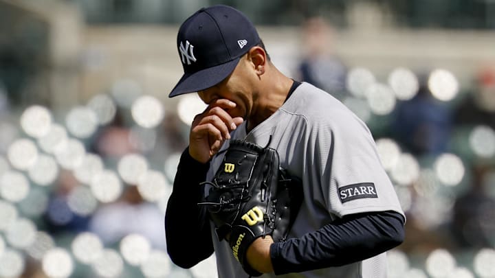 Apr 8, 2025; Detroit, Michigan, USA;  New York Yankees pitcher Carlos Carrasco (59) walks off the field in the fourth inning against the Detroit Tigers at Comerica Park.