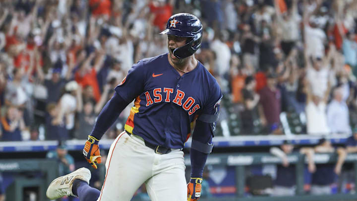 May 25, 2025; Houston, Texas, USA; Houston Astros first baseman Christian Walker (8) shouts after hitting a walk-off home run during the ninth inning against the Seattle Mariners at Daikin Park. 
