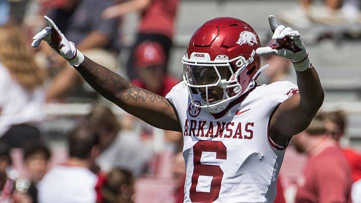 Arkansas Razorbacks defensive back Khmori House (6) celebrates after breaking up a pass play during the spring game at Razorback Stadium.