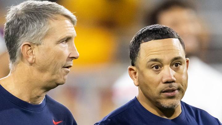 Nov 28, 2025; Tempe, Arizona, USA; Arizona Wildcats head coach Brent Brennan (left) with wide receivers coach Bobby Wade against the Arizona State Sun Devils during the 99th Territorial Cup at Mountain America Stadium. Mandatory Credit: Mark J. Rebilas-Imagn Images