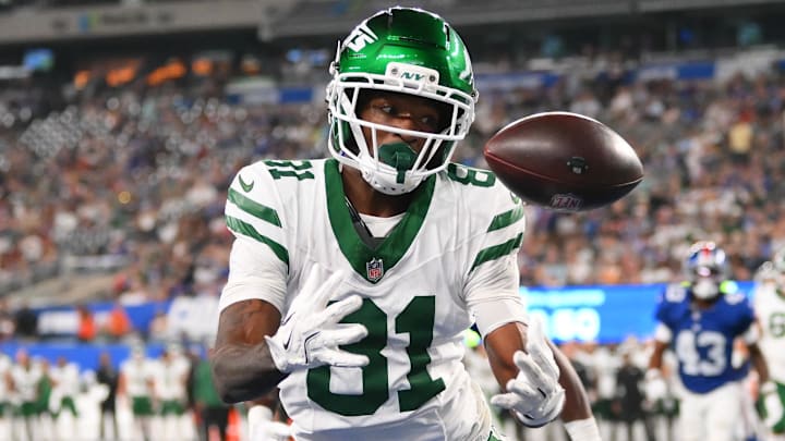 Aug 16, 2025; East Rutherford, New Jersey, USA; New York Jets wide receiver Ontaria Wilson (81) attempts to make a catch on a two-point conversion against the New York Giants during the second half at MetLife Stadium. The attempt would fail. Mandatory Credit: Rich Barnes-Imagn Images Aug 16, 2025; East Rutherford, New Jersey, USA; New York Jets wide receiver Ontaria Wilson (81) attempts to make a catch on a two-point conversion against the New York Giants during the second half at MetLife Stadium. The attempt would fail. Mandatory Credit: Rich Barnes-Imagn Images