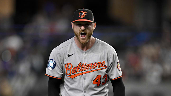 Baltimore Orioles relief pitcher Bryan Baker (43) celebrates after pitching against the Texas Rangers during the eighth inning at Globe Life Field on June 30. 