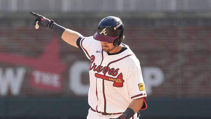 Sep 29, 2026; Cumberland, Georgia, USA;  Atlanta Braves third baseman Austin Riley (27) reacts after hitting a three run home run against the Philadelphia Phillies in the eighth inning during game one of the Wildcard round for the 2026 MLB Playoffs at Truist Park.  Mandatory Credit: Dale Zanine-Imagn Images
