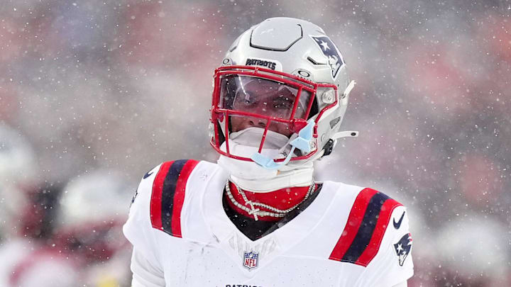 Jan 25, 2026; Denver, CO, USA; New England Patriots cornerback Christian Gonzalez (0) reacts after an interception against the Denver Broncos  during the second half in the 2026 AFC Championship Game at Empower Field at Mile High. Mandatory Credit: Ron Chenoy-Imagn Images