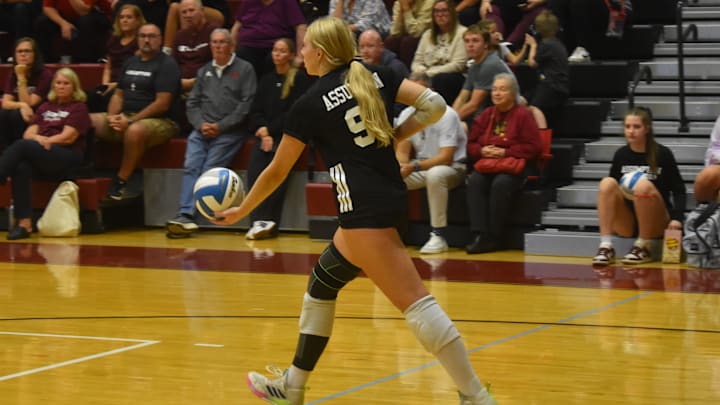 Assumption outside hitter Brooke Codey prepares to serve the ball last Thursday in a match against Louisville rival Mercy Academy. Assumption (ranked 9th nationally) prevailed in the contest, but these teams should meet again in the state tournament.