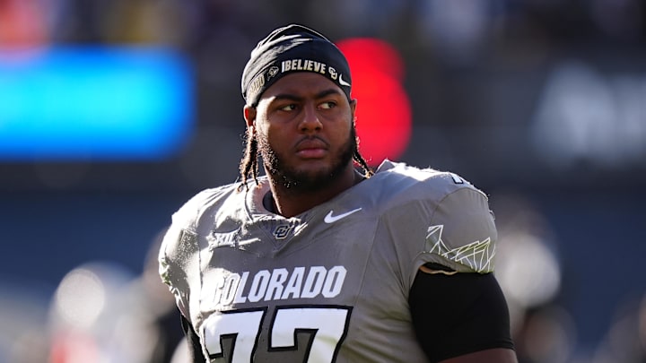 Nov 16, 2024; Boulder, Colorado, USA; Colorado Buffaloes offensive tackle Jordan Seaton (77) looks on before the game against the Utah Utes at Folsom Field.