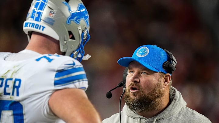 Detroit Lions offensive tackle Dan Skipper (70) talks to offensive line coach Hank Fraley during the second half against San Francisco 49ers at Levi's Stadium in Santa Clara, Calif. on Monday, Dec. 30, 2024.