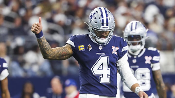 Dallas Cowboys quarterback Dak Prescott signals towards the sideline following a play against the Los Angeles Chargers Dallas Cowboys quarterback Dak Prescott signals towards the sideline following a play against the Los Angeles Chargers