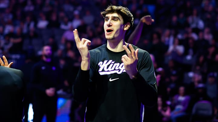 Jan 20, 2026; Sacramento, California, USA; Sacramento Kings center Maxime Raynaud (42) is greeted by teammates during player introductions before the game against the Miami Heat at Golden 1 Center. Mandatory Credit: Sergio Estrada-Imagn Images
