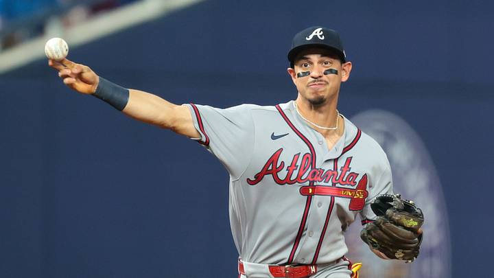 Sep 25, 2026; Miami, Florida, USA; Atlanta Braves left fielder Mauricio Dubón (14) throws to first base to retire Miami Marlins left fielder Heriberto Hernández (not pictured) during the sixth inning at loanDepot Park. Mandatory Credit: Sam Navarro-Imagn Images