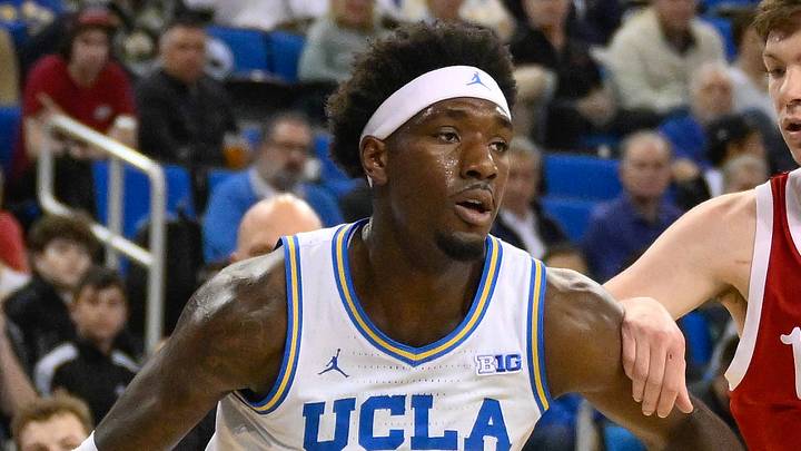 Mar 3, 2026; Los Angeles, California, USA; UCLA Bruins guard Eric Dailey Jr. (3) drives the baseline as Nebraska Cornhuskers forward Pryce Sandfort (21) moves in to defend during the 1st half at Pauley Pavilion presented by Wescom Financial. Mandatory Credit: Robert Hanashiro-Imagn Images
