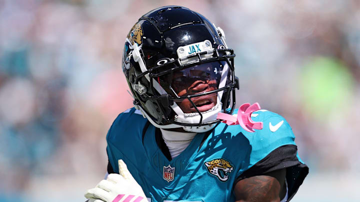 Oct 12, 2025; Jacksonville, Florida, USA; Jacksonville Jaguars wide receiver Travis Hunter (12) runs the ball during the first half against the Seattle Seahawks at EverBank Stadium. Mandatory Credit: Morgan Tencza-Imagn Images