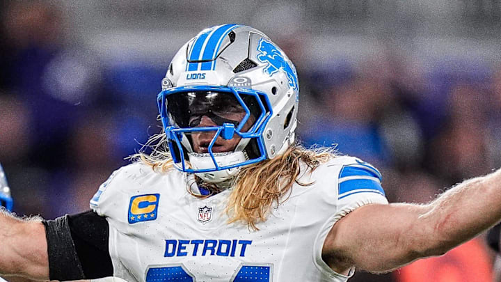 Alex Anzalone celebrates a tackle against the Baltimore Ravens during the second half