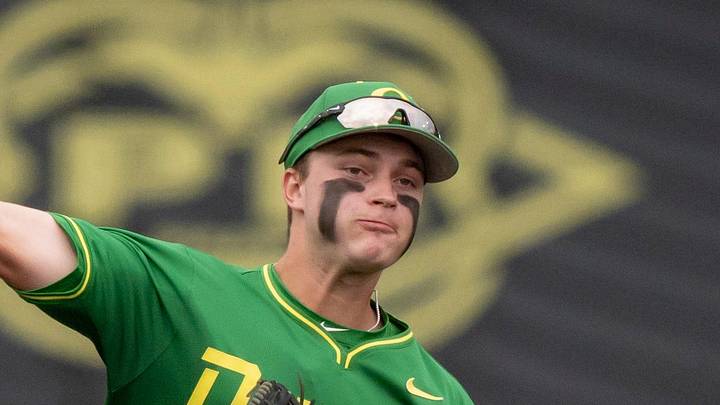 Oregon infielder Ryan Cooney throws to first for a double play as the Oregon Ducks host the Oregon State Beavers on April 25, 2025, at PK Park in Eugene. Oregon infielder Ryan Cooney throws to first for a double play as the Oregon Ducks host the Oregon State Beavers on April 25, 2025, at PK Park in Eugene.