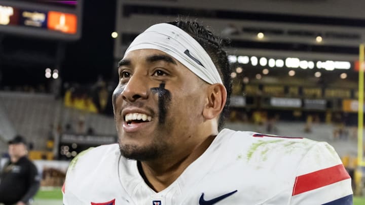 Nov 28, 2025; Tempe, Arizona, USA; Arizona Wildcats quarterback Noah Fifita (1) after defeating the Arizona State Sun Devils in the 99th Territorial Cup at Mountain America Stadium. Mandatory Credit: Mark J. Rebilas-Imagn Images