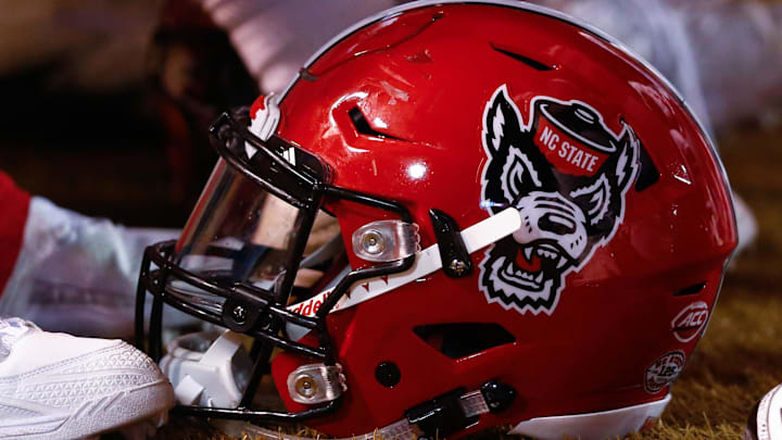 Nov 18, 2017; Winston-Salem, NC, USA; A North Carolina State Wolfpack helmet lays on the sidelines during the game against the Wake Forest Demon Deacons at BB&T Field. Mandatory Credit: Jeremy Brevard-Imagn Images
