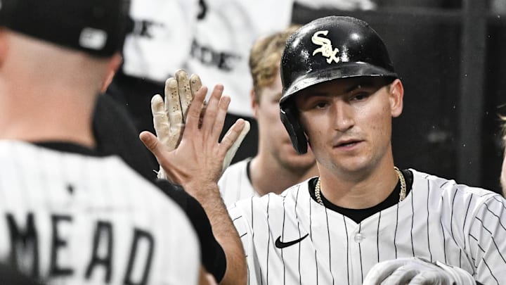 Sep 20, 2025; Chicago, Illinois, USA;  Chicago White Sox shortstop Colson Montgomery (12) celebrates in the dugout after he scores during the first inning against the San Diego Padres at Rate Field. Mandatory Credit: Matt Marton-Imagn Images