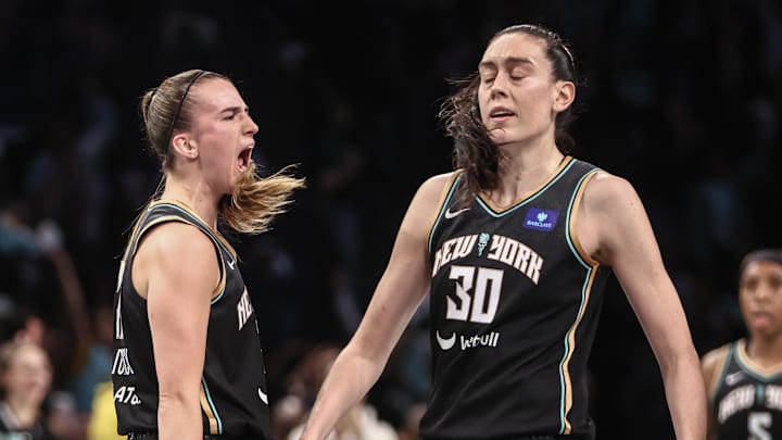 Sep 24, 2024; Brooklyn, New York, USA; New York Liberty guard Sabrina Ionescu (20) celebrates with forward Breanna Stewart (30) during game two of the first round of the 2024 WNBA Playoffs against the Atlanta Dream at Barclays Center. Mandatory Credit: Wendell Cruz-Imagn Images Sep 24, 2024; Brooklyn, New York, USA; New York Liberty guard Sabrina Ionescu (20) celebrates with forward Breanna Stewart (30) during game two of the first round of the 2024 WNBA Playoffs against the Atlanta Dream at Barclays Center. Mandatory Credit: Wendell Cruz-Imagn Images