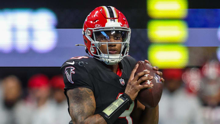 Atlanta Falcons quarterback Michael Penix Jr. looks to throw a pass.