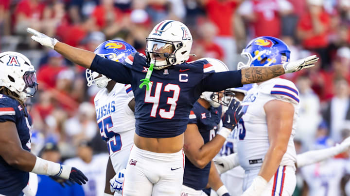 Nov 8, 2025; Tucson, Arizona, USA; Arizona Wildcats defensive back Dalton Johnson (43) celebrates a missed field goal by the Kansas Jayhawks in the second half at Arizona Stadium. Mandatory Credit: Mark J. Rebilas-Imagn Images