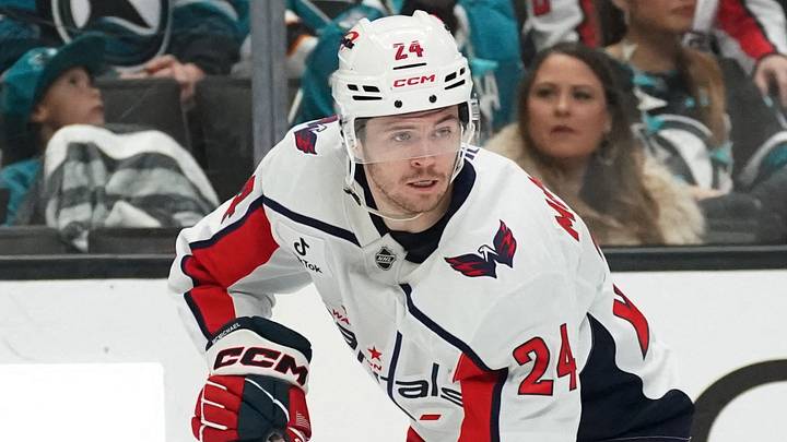 Dec 3, 2025; San Jose, California, USA;  Washington Capitals center Connor McMichael (24) controls the puck against the San Jose Sharks in the first period at SAP Center at San Jose. Mandatory Credit: David Gonzales-Imagn Images