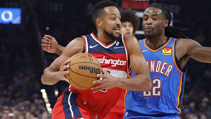 Oct 30, 2025; Oklahoma City, Oklahoma, USA; Washington Wizards guard CJ McCollum (3) drives past Oklahoma City Thunder guard Cason Wallace (22) during the second quarter at Paycom Center. Mandatory Credit: Alonzo Adams-Imagn Images