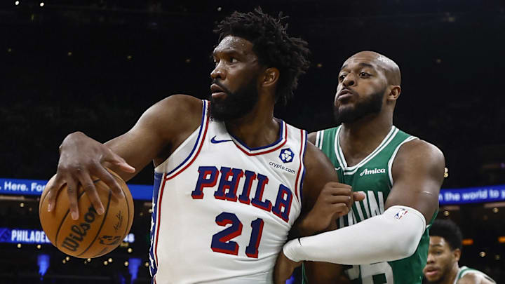 Oct 22, 2025; Boston, Massachusetts, USA;Boston Celtics forward Xavier Tillman (26) grabs hold of Philadelphia 76ers center Joel Embiid (21) during the second quarter at TD Garden. Mandatory Credit: Winslow Townson-Imagn Images Oct 22, 2025; Boston, Massachusetts, USA;Boston Celtics forward Xavier Tillman (26) grabs hold of Philadelphia 76ers center Joel Embiid (21) during the second quarter at TD Garden. Mandatory Credit: Winslow Townson-Imagn Images