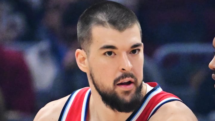 Nov 23, 2025; Cleveland, Ohio, USA; Los Angeles Clippers center Ivica Zubac (40) drives to the basket against Cleveland Cavaliers center Evan Mobley (4) during the first quarter at Rocket Arena. Mandatory Credit: Ken Blaze-Imagn Images