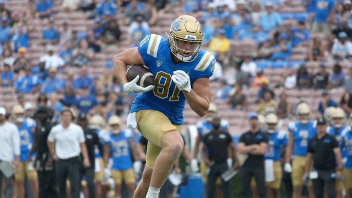 Sep 10, 2022; Pasadena, California, USA; UCLA Bruins tight end Hudson Habermehl (81) carries the ball on a touchdown reception against the Alabama State Hornets in the first half at Rose Bowl. Mandatory Credit: Kirby Lee-Imagn Images