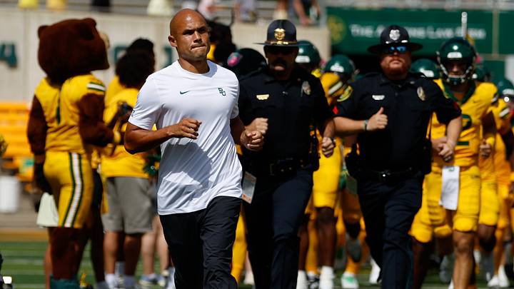 Sep 19, 2026; Waco, Texas, USA; Baylor Bears head coach Dave Aranda runs onto the field with his team before the game against the Louisiana Tech Bulldogs at McLane Stadium. Mandatory Credit: Chris Jones-Imagn Images Sep 19, 2026; Waco, Texas, USA; Baylor Bears head coach Dave Aranda runs onto the field with his team before the game against the Louisiana Tech Bulldogs at McLane Stadium. Mandatory Credit: Chris Jones-Imagn Images