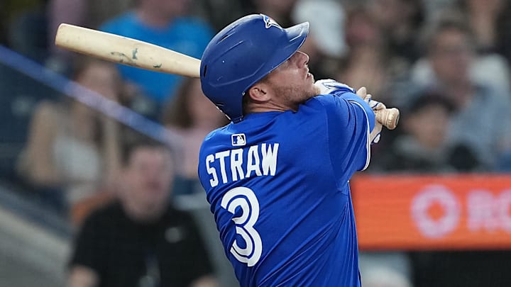 Apr 14, 2025; Toronto, Ontario, CAN; Toronto Blue Jays centre fielder Myles Straw (3) hits a home run against the Atlanta Braves during the sixth inning at Rogers Centre