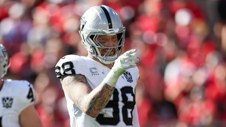 Dec 8, 2024; Tampa, Florida, USA; Las Vegas Raiders defensive end Maxx Crosby (98) celebrates after a sack against the Tampa Bay Buccaneers in the second quarter at Raymond James Stadium. Mandatory Credit: Nathan Ray Seebeck-Imagn Images