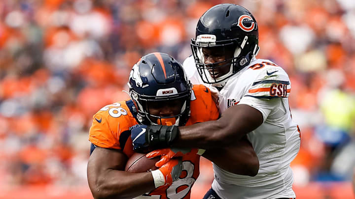 Sep 15, 2019; Denver, CO, USA; Chicago Bears linebacker Roquan Smith (58) tackles Denver Broncos running back Royce Freeman (28) in the second quarter at Empower Field at Mile High. Mandatory Credit: Isaiah J. Downing-Imagn Images