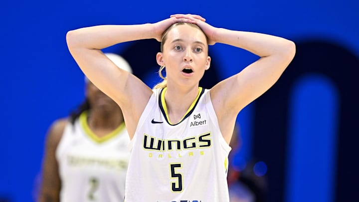Sep 11, 2025; Arlington, Texas, USA; Dallas Wings guard Paige Bueckers (5) reacts to a call during the first half against the Phoenix Mercury at College Park Center. Mandatory Credit: Jerome Miron-Imagn Images
