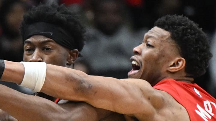 Toronto Raptors guard Alijah Martin forces a turnover by knocking the ball from Philadelphia 76ers guard VJ Edgecombe