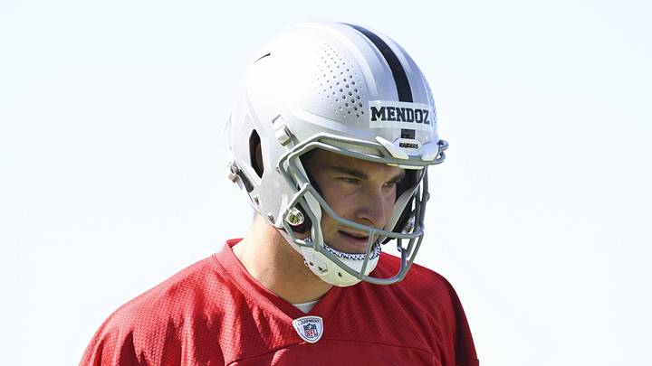 Las Vegas Raiders quarterback Fernando Mendoza stretches during organized team activities.
