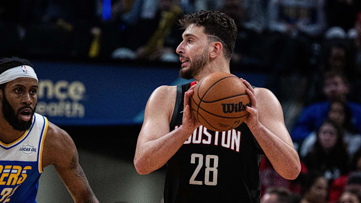 Feb 2, 2026; Indianapolis, Indiana, USA;  Houston Rockets center Alperen Sengun (28) holds  the ball while Indiana Pacers forward Isaiah Jackson (22)  defends in the second half at Gainbridge Fieldhouse. Mandatory Credit: Trevor Ruszkowski-Imagn Images