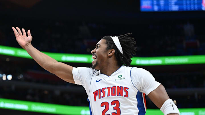 Jan 7, 2026; Detroit, Michigan, USA; Detroit Pistons guard Jaden Ivey (23) shoots the ball over Chicago Bulls guard Kevin Huerter (13) in the first quarter at Little Caesars Arena. Mandatory Credit: Lon Horwedel-Imagn Images