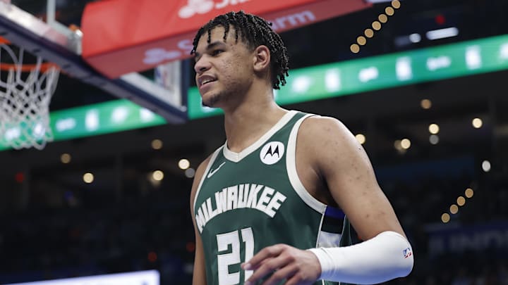 Feb 12, 2026; Oklahoma City, Oklahoma, USA;  Milwaukee Bucks forward Ousmane Dieng (21) smiles after a play against the Oklahoma City Thunder during the second half at Paycom Center. Mandatory Credit: Alonzo Adams-Imagn Images