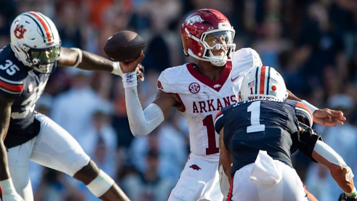 Arkansas Razorbacks quarterback Taylen Green (10) throws the ball under pressure from Auburn Tigers defensive back Jerrin Thompson (1) at Jordan-Hare Stadium in Auburn, Ala. Arkansas Razorbacks quarterback Taylen Green (10) throws the ball under pressure from Auburn Tigers defensive back Jerrin Thompson (1) at Jordan-Hare Stadium in Auburn, Ala.