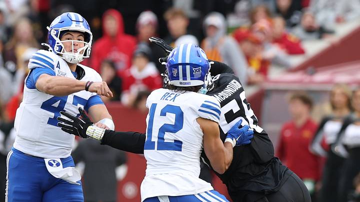 Oct 25, 2025; Ames, Iowa, USA; BYU Cougars quarterback Bear Bachmeier (47) throws a pass to BYU Cougars running back Preston Rex (12) during the Iowa State Cyclones at Jack Trice Stadium. Mandatory Credit: Reese Strickland-Imagn Images