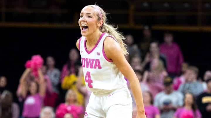 Iowa guard Kylie Feuerbach (4) reacts during a basketball game against the Washington Huskies Feb. 11, 2026 at Carver-Hawkeye Arena in Iowa City, Iowa.