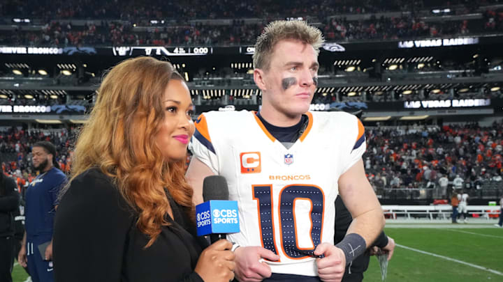 Dec 7, 2025; Paradise, Nevada, USA; Denver Broncos quarterback Bo Nix (10) with CBS sideline reporter AJ Ross following a game against the Las Vegas Raiders at Allegiant Stadium. Mandatory Credit: Kirby Lee-Imagn Images